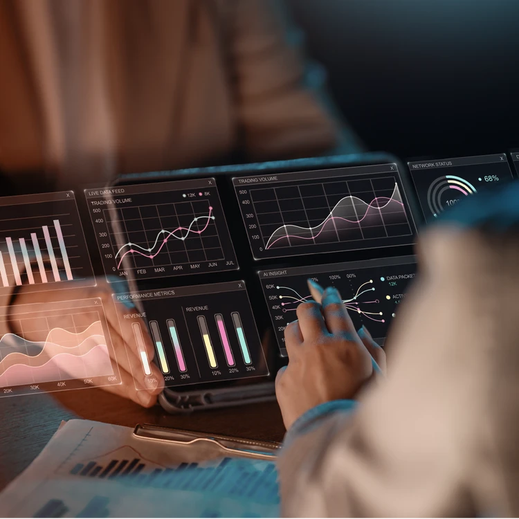 Hands of two professionals analyzing holographic dashboards and charts on a tablet, symbolizing a data-driven process and resource optimization through right sizing.